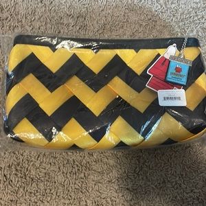 Harvey’s plaza convertible clutch Charlie Brown